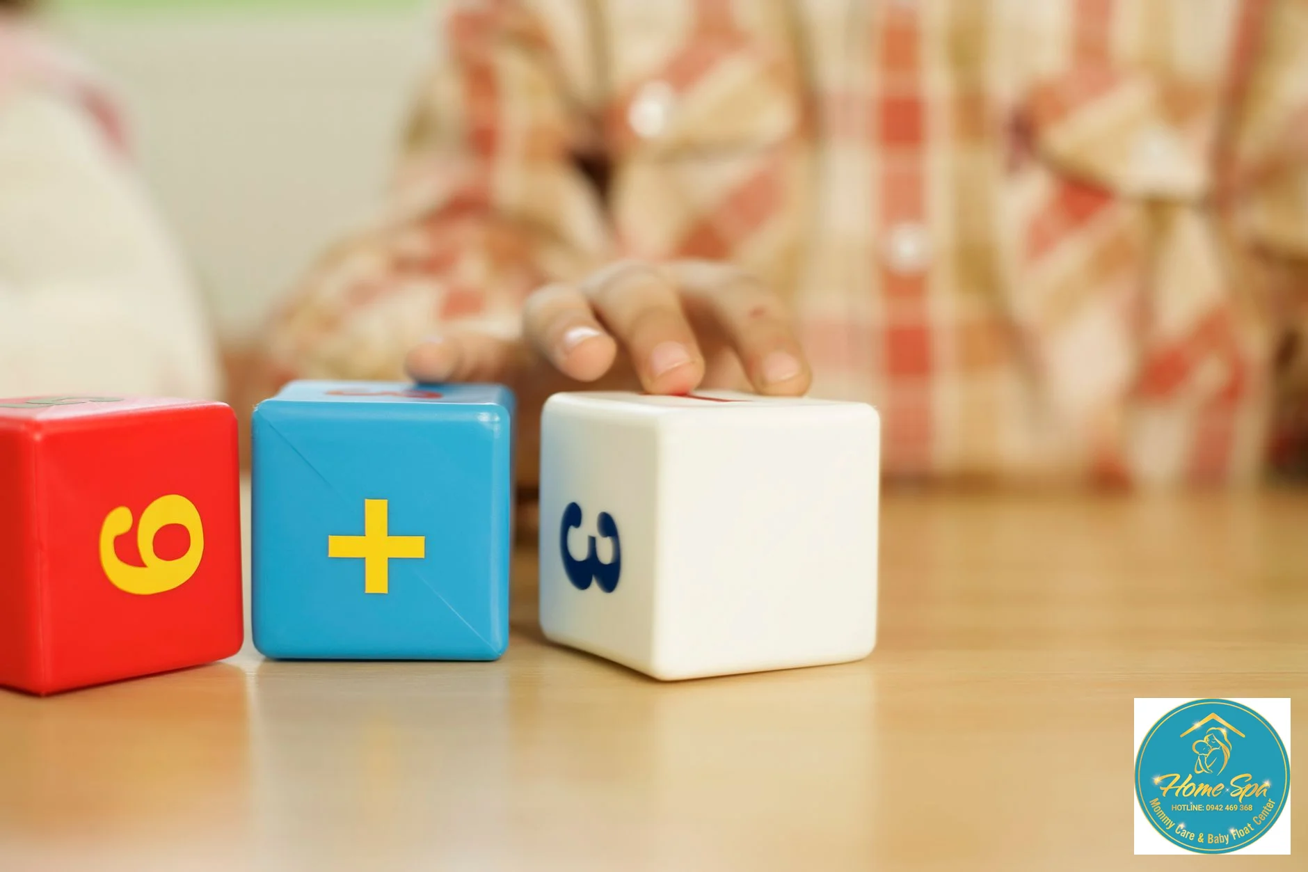 close-up photo of a child's hand holding a colorful building block, with a blurred adult hand gently guiding, symbolizing early education and mentorship, 1024x1024