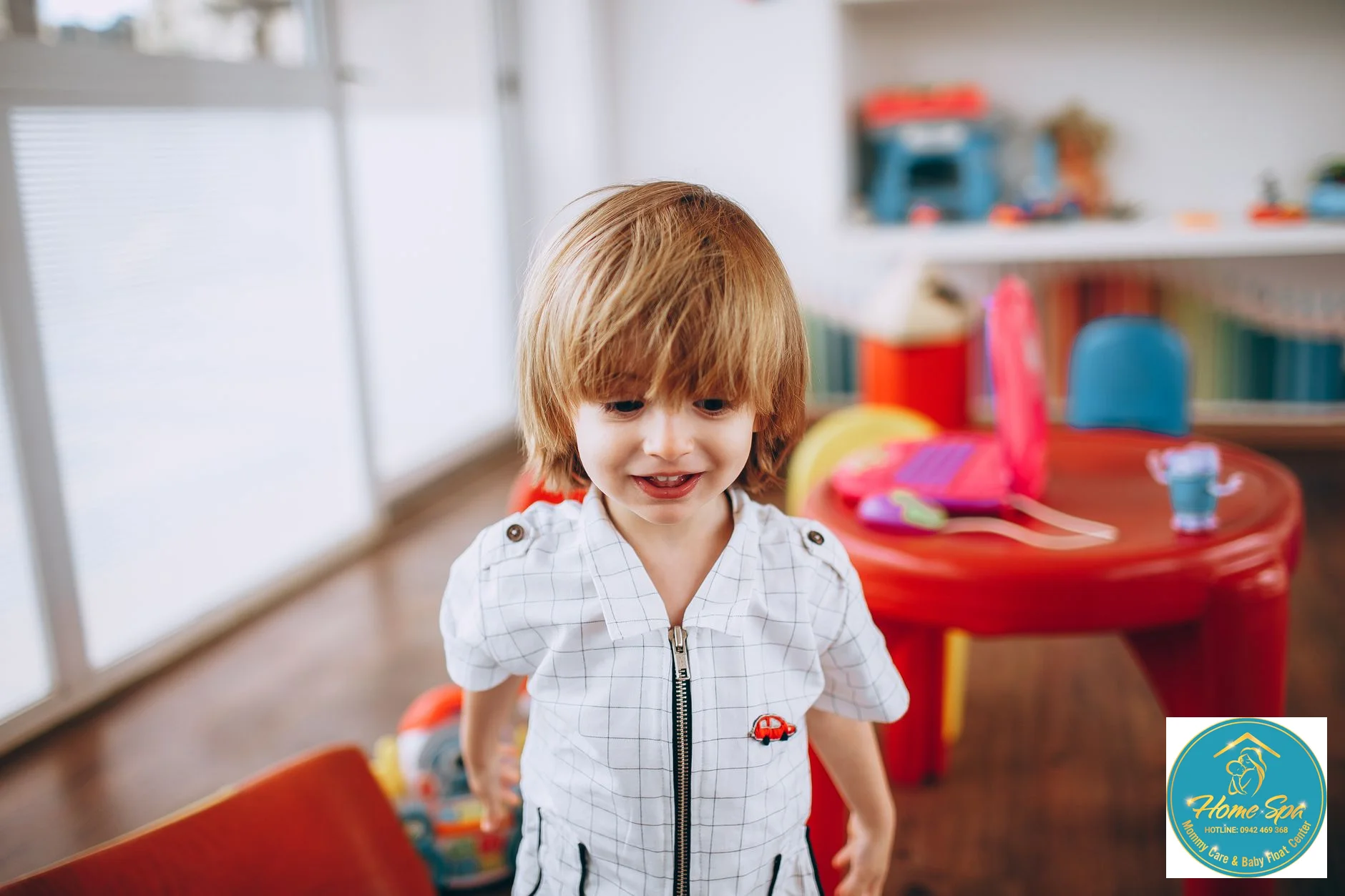 a professional photo of a child happily playing and learning in a bright, child-friendly environment, 1024x1024