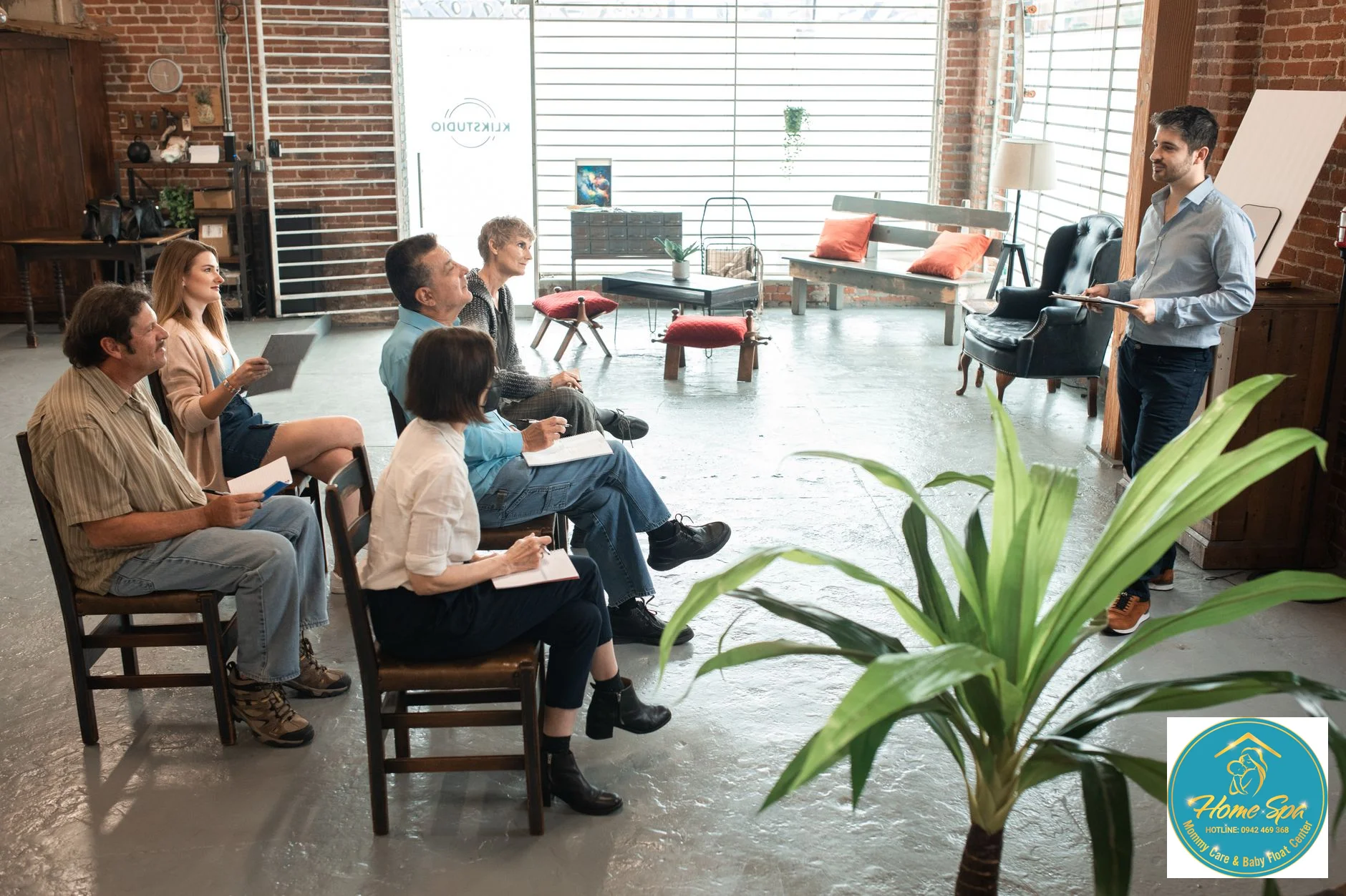 professional photo of a diverse group of adults in a classroom setting, learning childcare skills with a qualified instructor, 1024x683