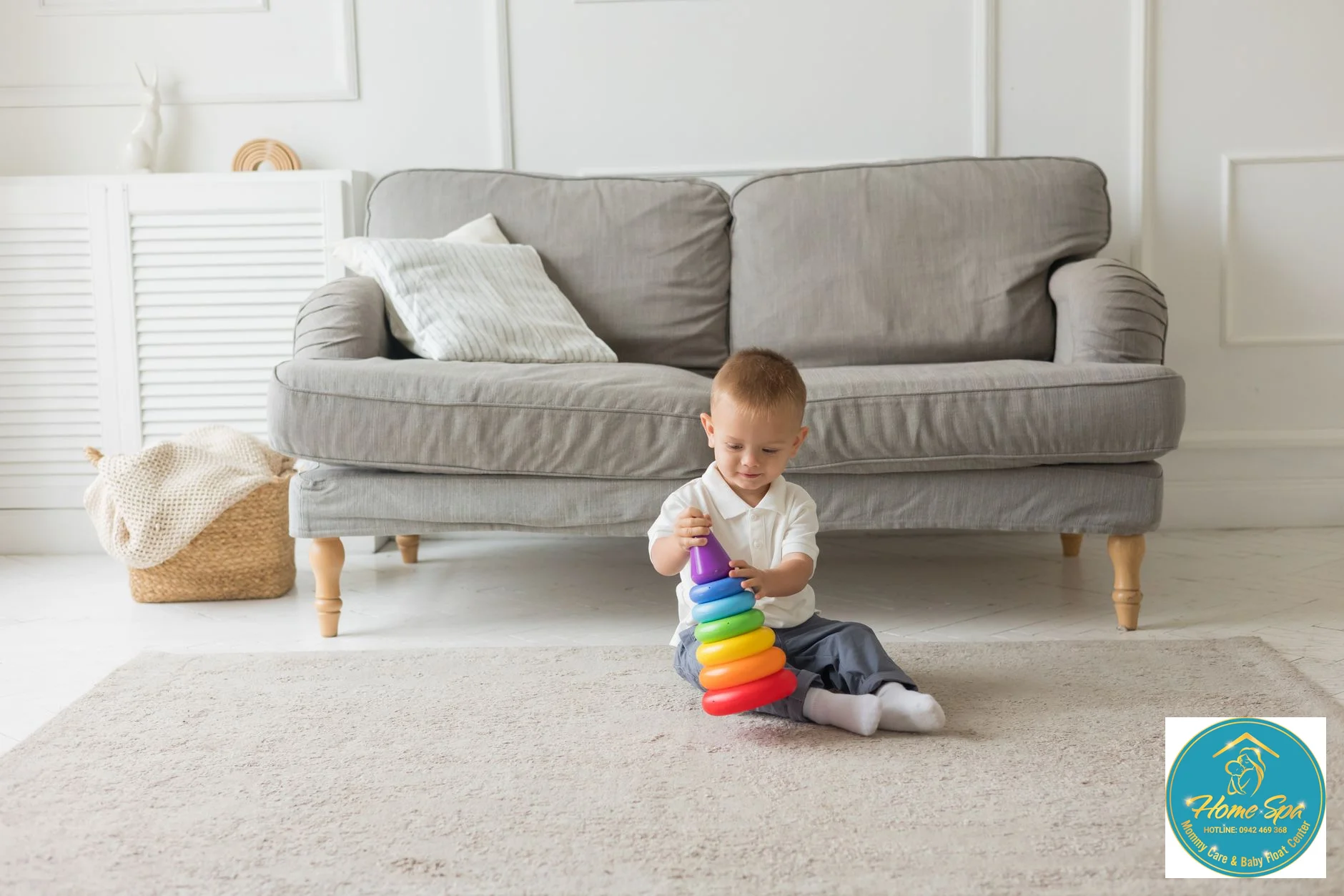 a professional nanny interacting joyfully with a toddler in a bright, clean living room, focusing on developmental play, 1024x1024
