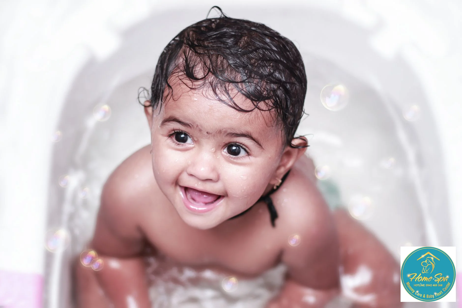 professional photo of a baby in a hydrotherapy pool, gentle bubbles, happy expression, 1024x1024