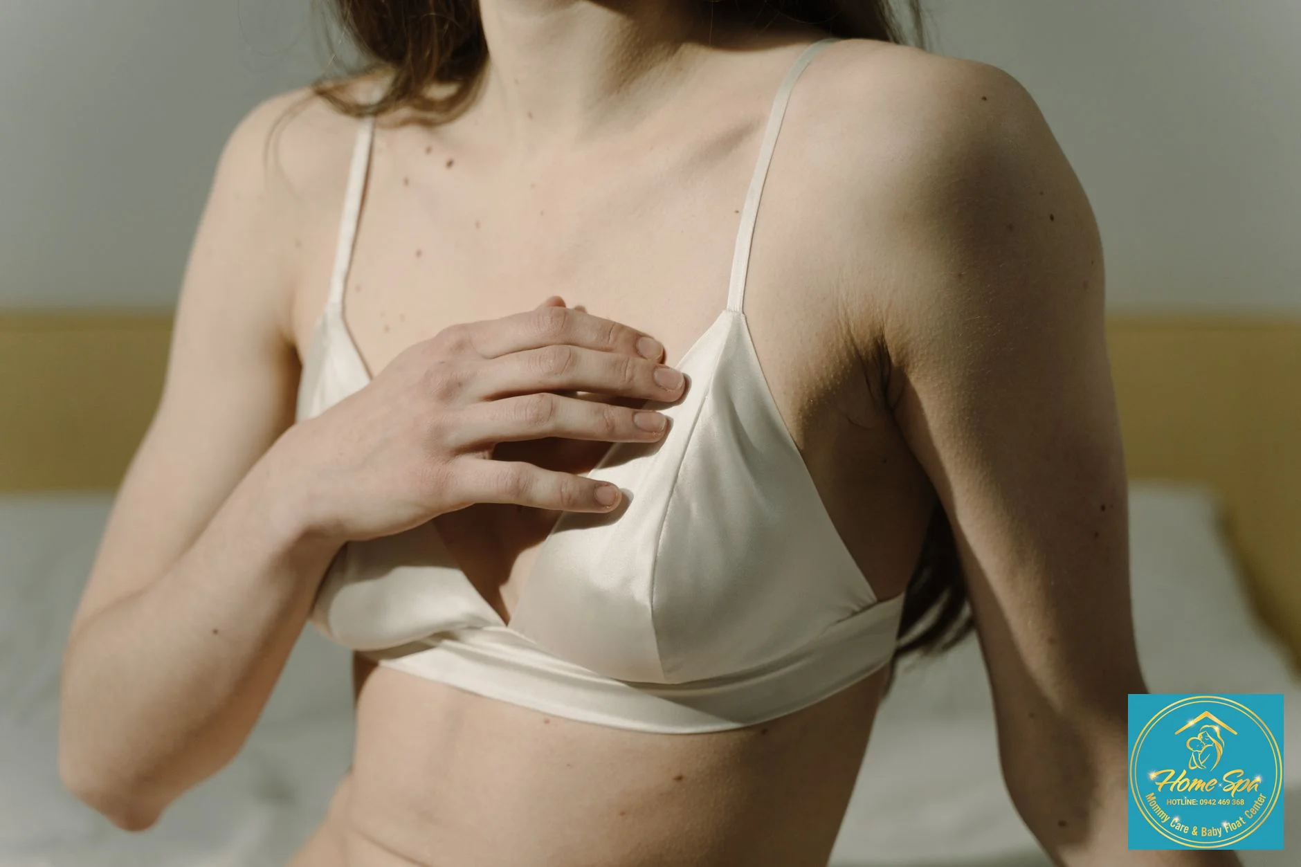 professional photo of a mother gently examining her breast, looking for subtle changes in skin texture, soft lighting, 1024x1024