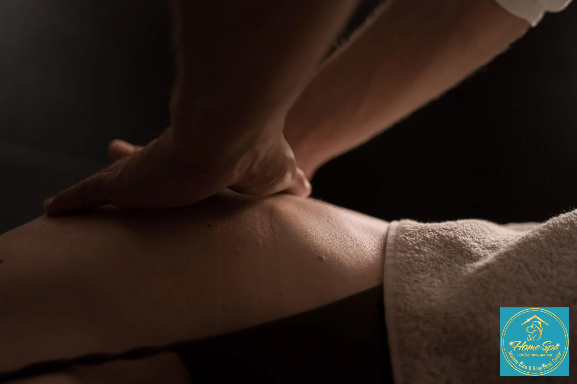 professional female therapist performing gentle breast massage for new mother, soft lighting, focus on hands, 1024x1024