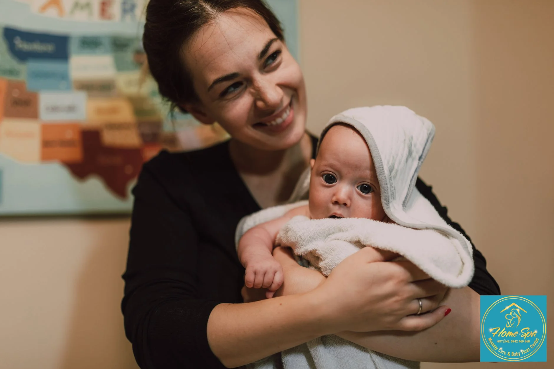 professional photo of a mother gently pat-drying her newborn baby with a soft, warm towel after a bath, warm lighting, 1024x1024