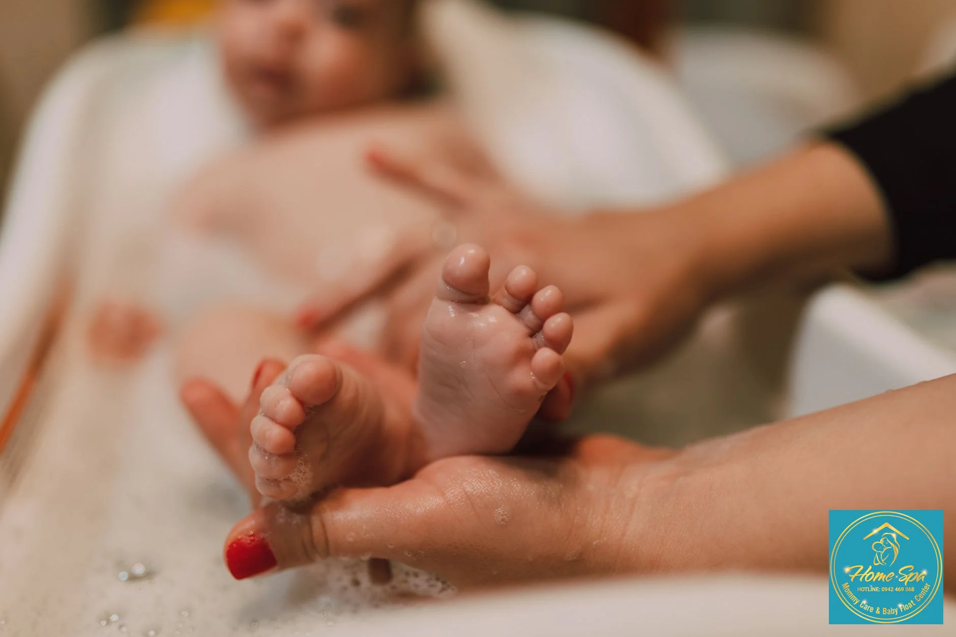 professional photo of a gentle hand bathing a newborn baby in a small tub, warm soft lighting, focus on safety and tenderness, 1024x1024