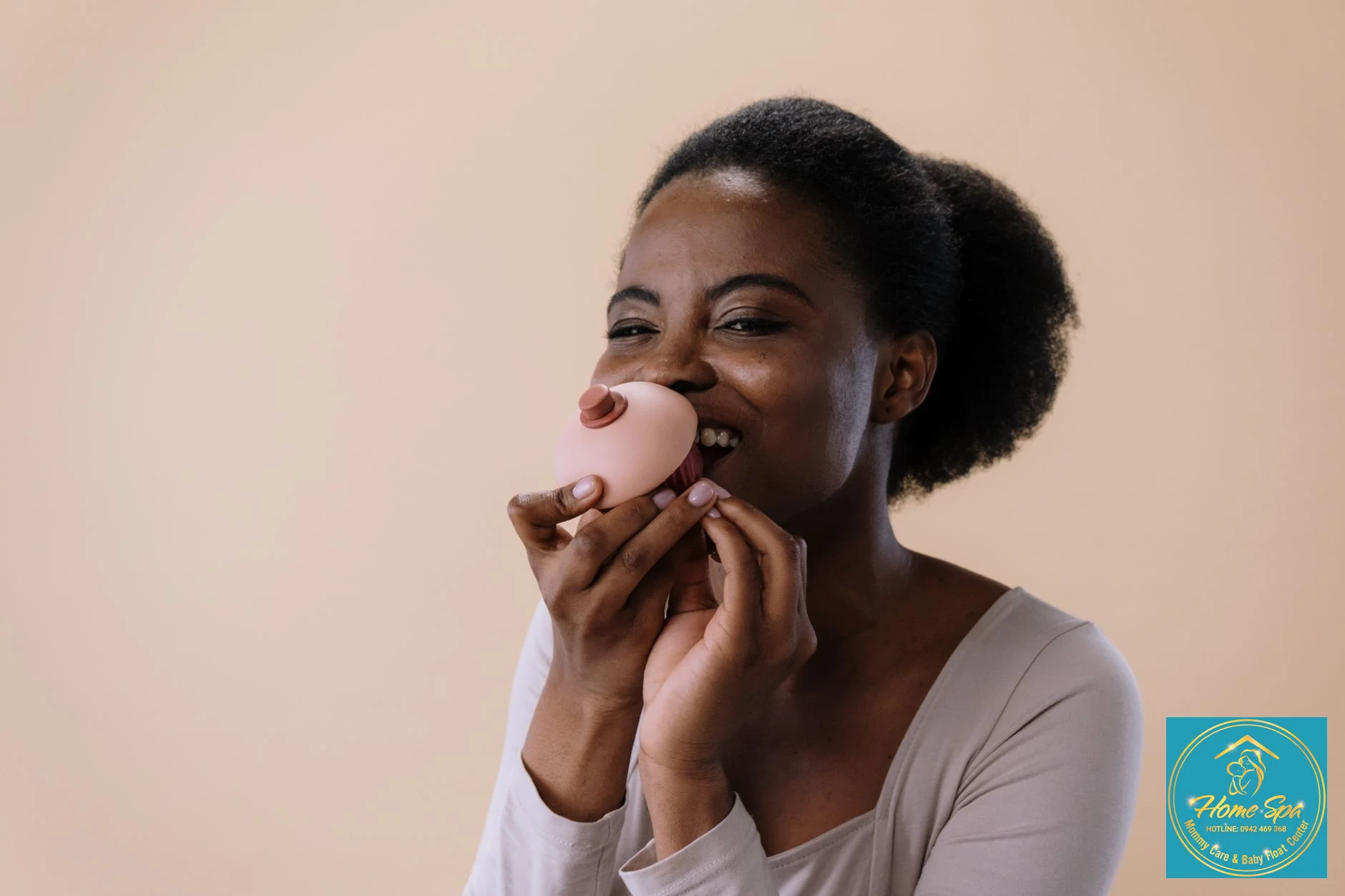 A mother looking stressed while using a breast pump, perhaps checking the flange size, with a focus on her discomfort, 1024x1024