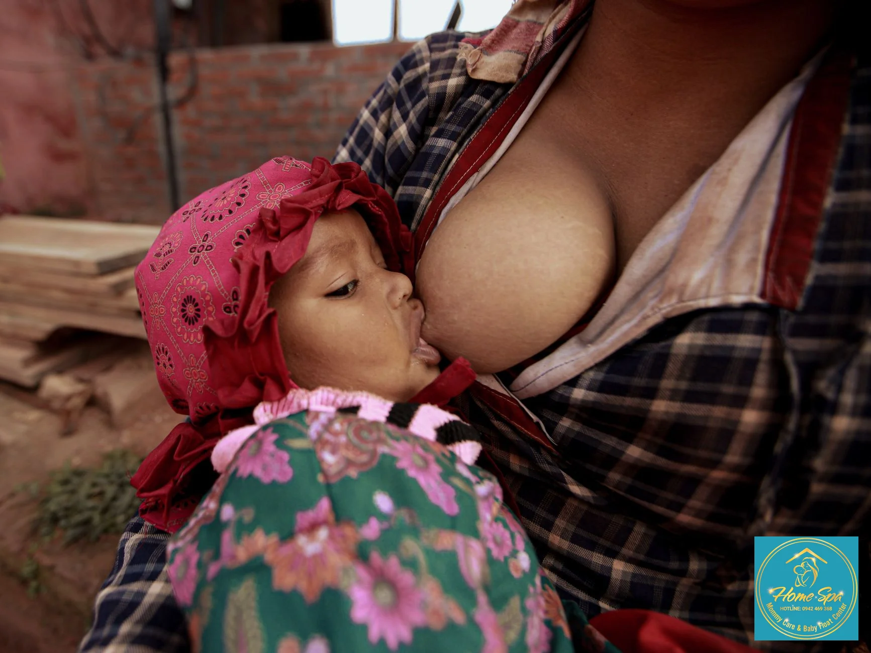 professional photo of a mother gently applying essential oil to her breast while breast-feeding, soft natural light, focused on hands and breast area, 1024x1024