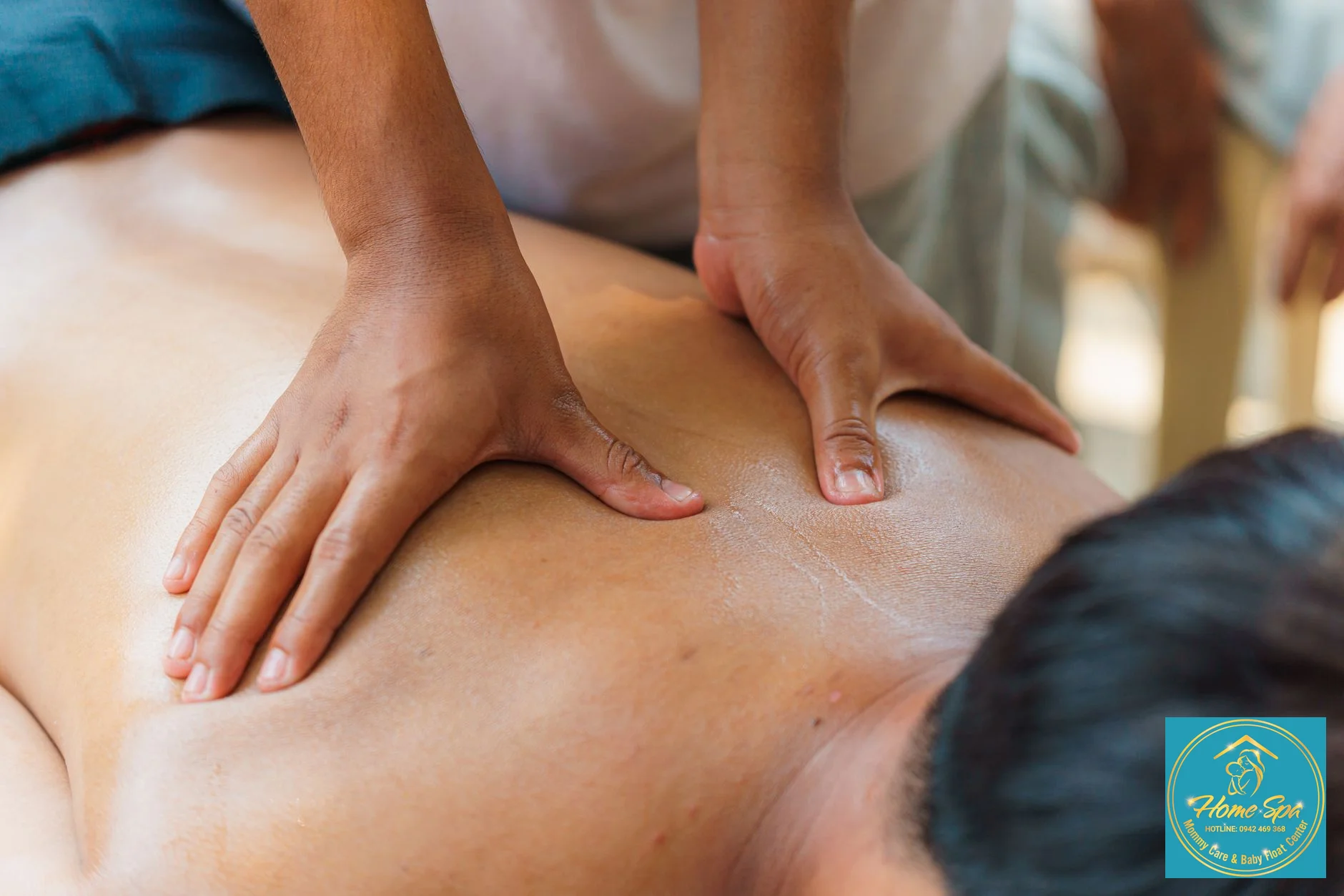 close-up of a mother's hand gently massaging her breast with essential oil, showing the correct technique, focus on hands and skin, 1024x1024