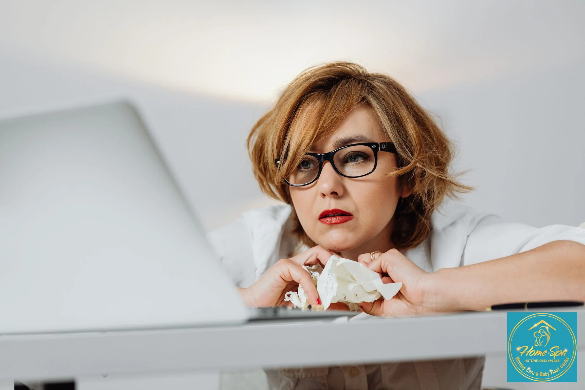 professional photo of a busy mother trying to pump milk while working, looking stressed, 1024x1024