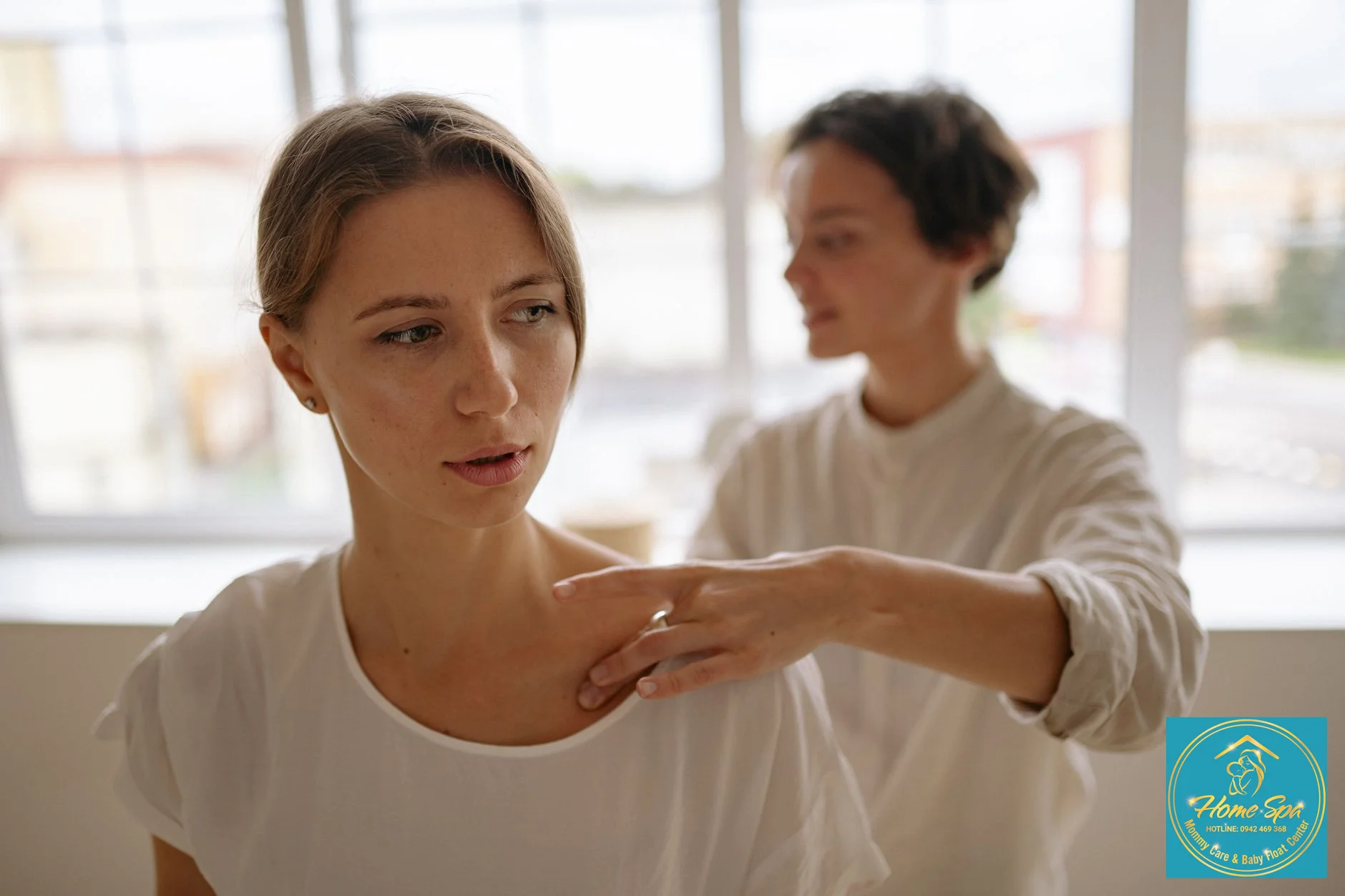 professional photo of a nurse or therapist gently massaging a woman's breast, focus on gentle technique, 1024x1024